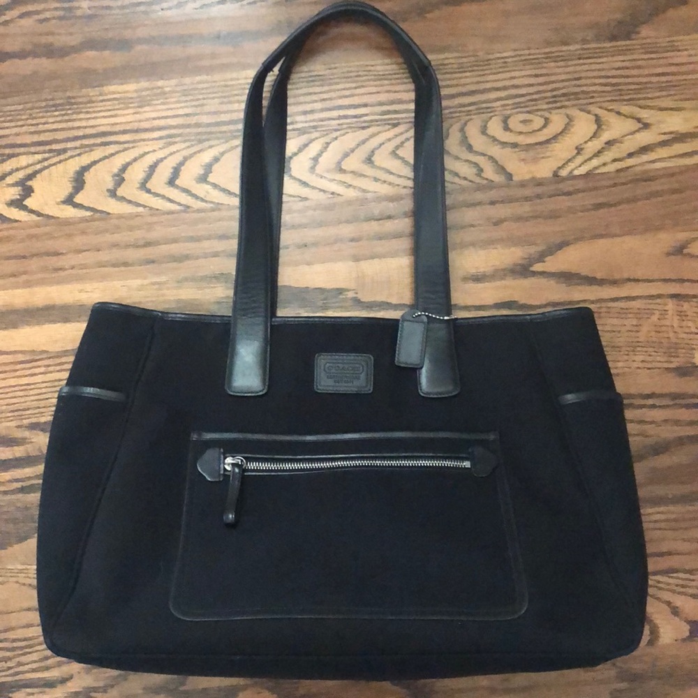 Coach diaper bag with changing mat